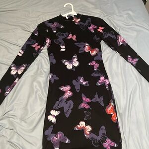 Long sleeve quarter turtle neck knee-high tight butterfly dress.